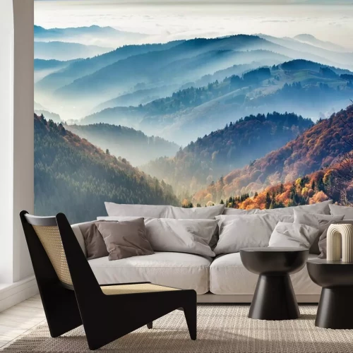 Fotobehang Een schilderachtig berglandschap bedekt met mist