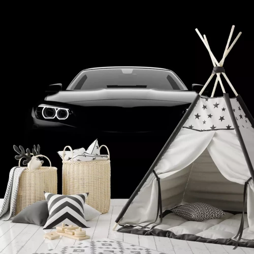 Sticker Een zwarte auto in een zeer donkere omgeving