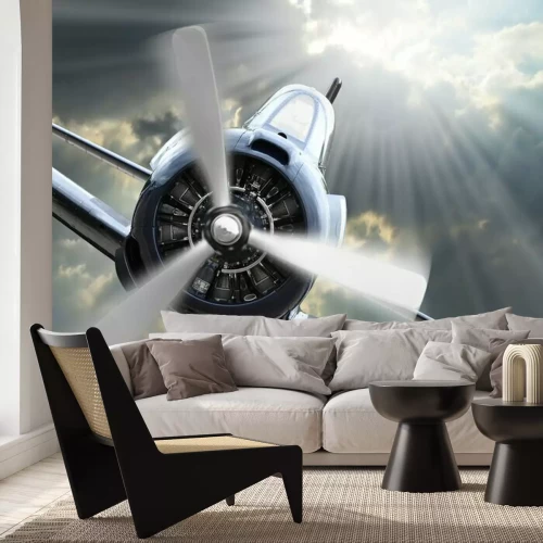 Fotobehang Een vintage vliegtuig in de wolken