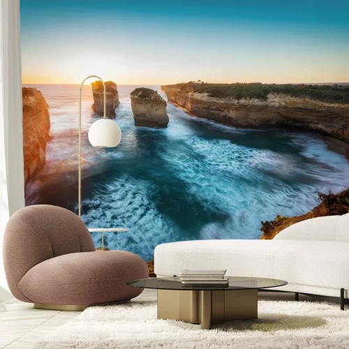 Fotobehang Landschap met oceaan en bergen