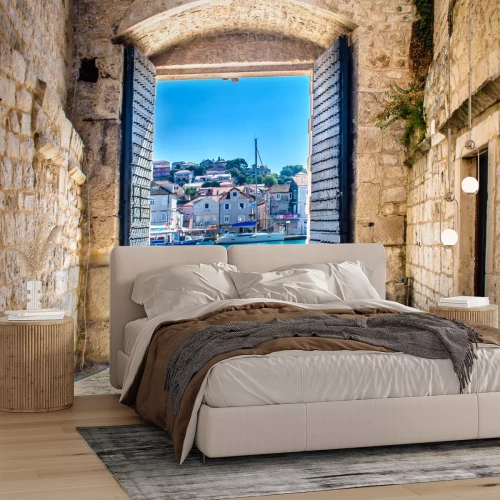 Fotobehang Poort met uitzicht op de haven