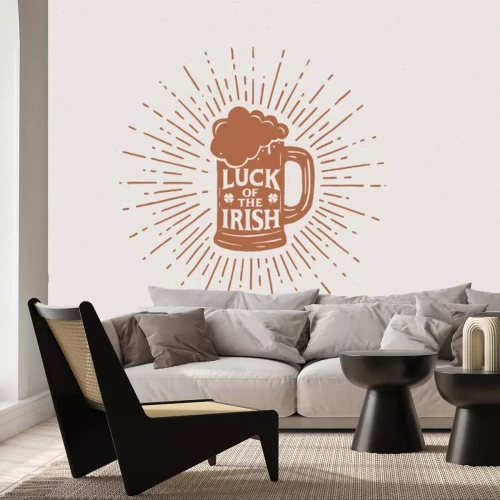 Sticker Hands drawn beer mug with the inscription Irish luck in the rays of light. Vintage illustration on the theme of St. Patrick's Day. Monochrome engraving style.