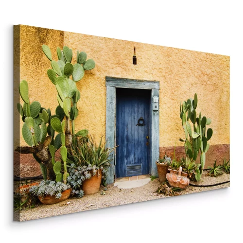 Canvas Rustieke architectuur, blauwe deuren en groene cactussen