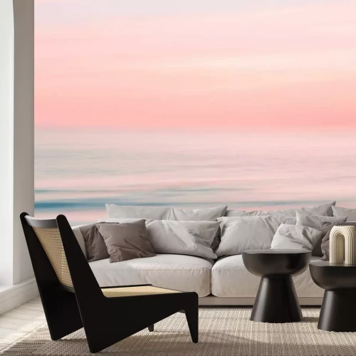 Fotobehang Een roze dageraad boven de uitgestrekte horizon