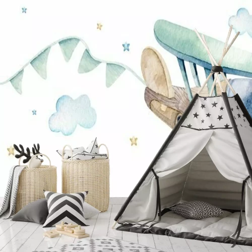 Sticker Een houten vliegtuig trekt vlaggen achter zich aan