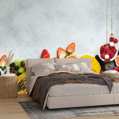 Sticker Healthy raw rainbow fruits background, mango papaya strawberries oranges passion fruits berries on oval serving plate on light kitchen top, top view, copy space, selective focus