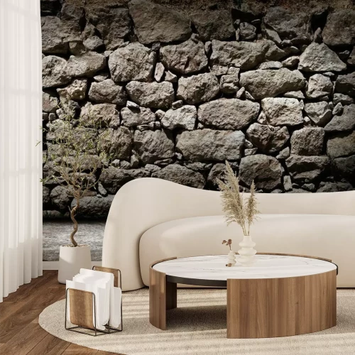 Fotobehang Stenen muur in een donker steegje