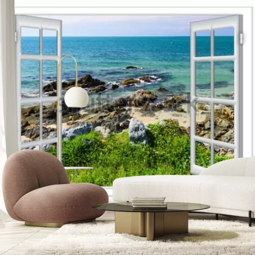 Fotobehang Uitzicht op zee vanuit een raam op een eiland op een zonnige zomerdag