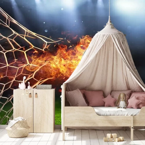 Sticker Een brandende bal die door het net van een voetbaldoel gaat