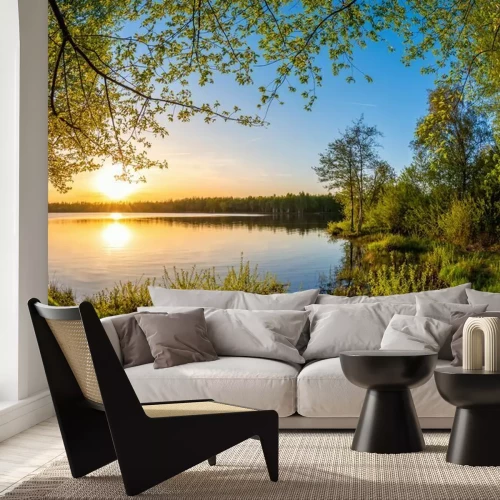 Fotobehang Zonsondergang boven het meer schilderachtig landschap