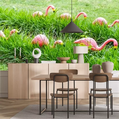 Sticker Flamingo's tussen het groene gras