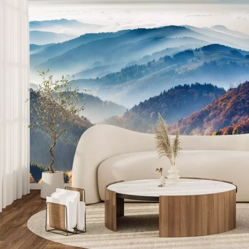 Fotobehang Herfstheuvels in een mistig landschap