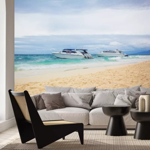 Fotobehang The cruise boats on the beach. The cruise boats parked near the sandy shore. Horizontal outdoors shot. 