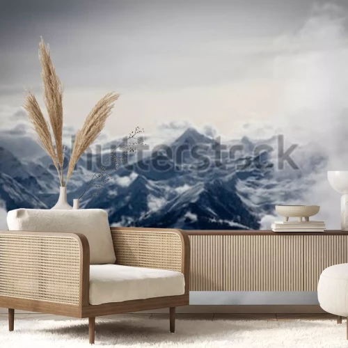 Fotobehang Bergen in witte wolken