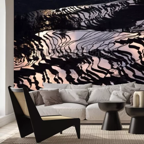 Fotobehang Zonsondergang weerkaatst op het veld