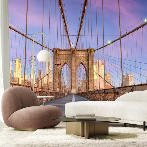 Fotobehang New York, New York on the Brooklyn Bridge Promenade facing Manhattan's skyline at dawn.