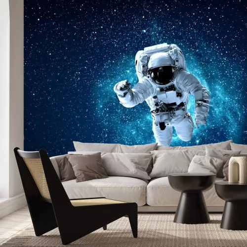 Fotobehang Zwevende astronaut in het heelal