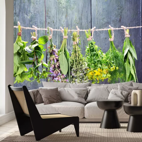 Fotobehang Kruidenboeketten op een houten achtergrond