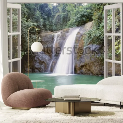 Fotobehang Uitzicht vanuit het raam op de waterval en de rotsen