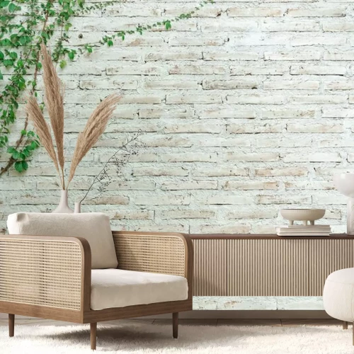 Fotobehang Klimop op een beige muur