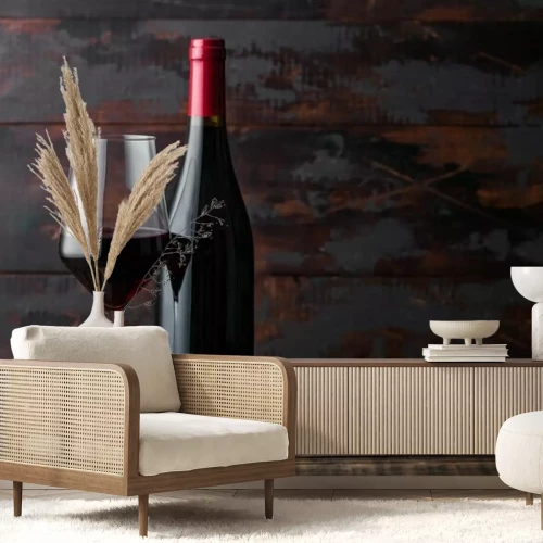 Fotobehang Glas wijn en fles op een houten achtergrond