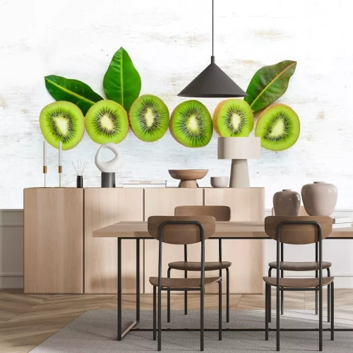 Sticker Fresh kiwi on a white wooden table. Rustic style. Fruits. Top view. Free space for text.