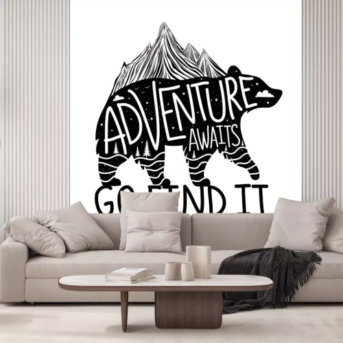 Sticker Vector illustration with bear silhouette and lettering text - Adventure awaits, Go find it.