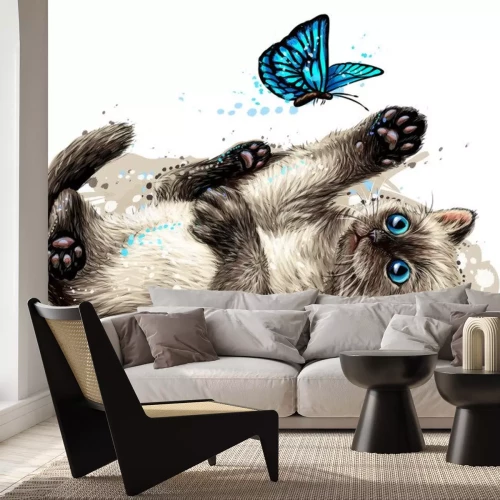 Sticker Een kitten en een blauwe vlinder