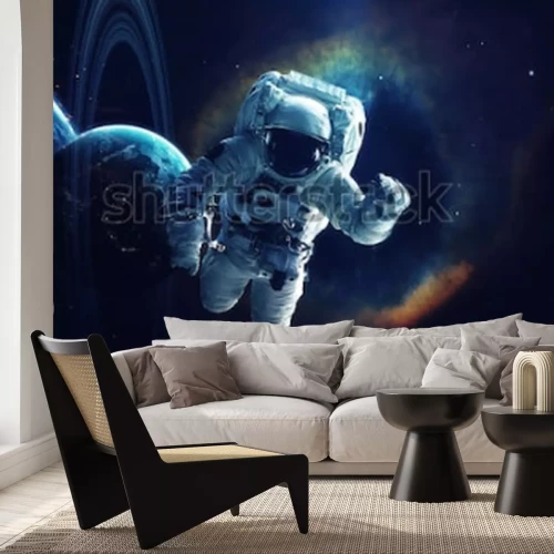Fotobehang Het heelal en een astronaut