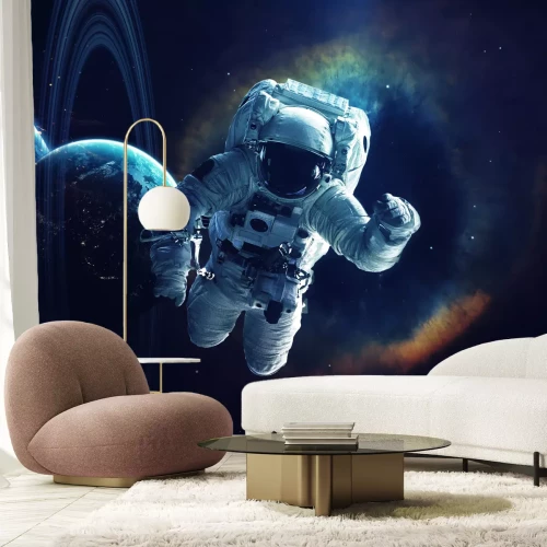 Fotobehang Het heelal en een astronaut