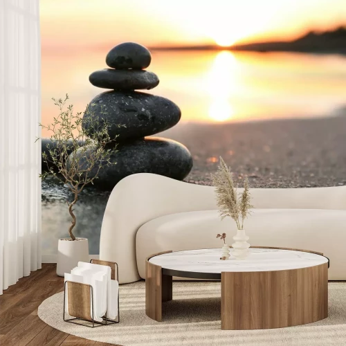 Fotobehang Stenen op een achtergrond van zonsondergang