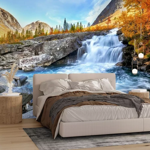 Fotobehang Herfstlandschap met een waterval