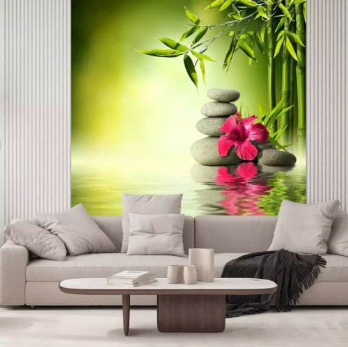 Fotobehang Bamboebloemen en stenen