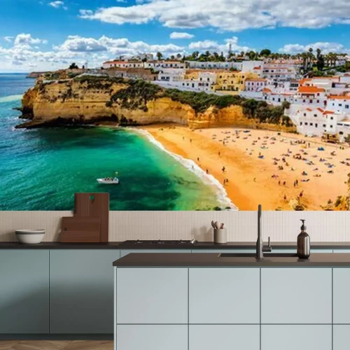 Fotobehang Uitzicht op het strand en de stad Carvoeiro in Portugal