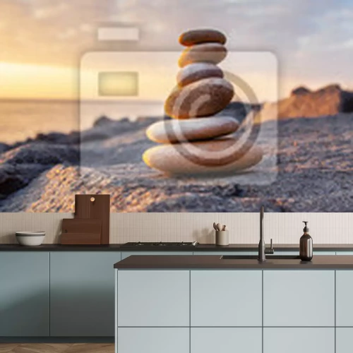 Fotobehang Een piramide van stenen aan de kust bij zonsondergang