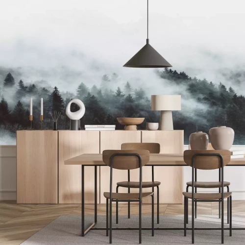 Sticker Een nostalgisch uitzicht op een bos in de mist