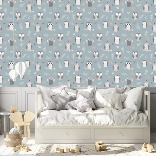Behang Esthetische uilen op een lichtblauwe achtergrond