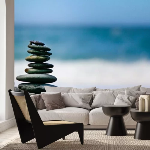 Fotobehang Stenen op een achtergrond van de oceaan