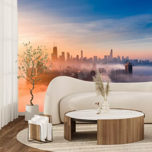 Fotobehang De stad is &#39;s ochtends in mist gehuld