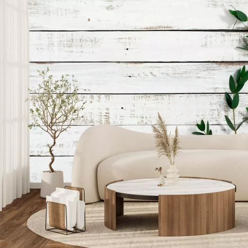 Fotobehang Eucalyptusbladeren op een houten vloer