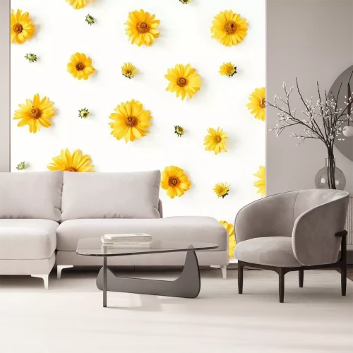 Fotobehang Gele kleine en grote madeliefjes