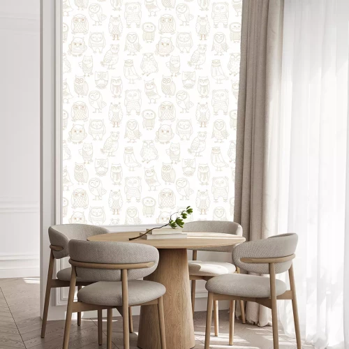 Behang Heldere uilen op een witte achtergrond