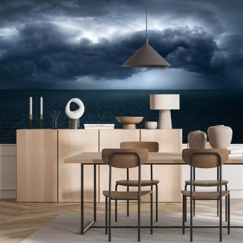 Fotobehang Wolken boven donkere zee