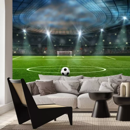 Fotobehang Bal op het groene gras van het voetbalstadion