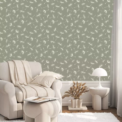 Behang Witte paardebloemzaden op een grijze achtergrond