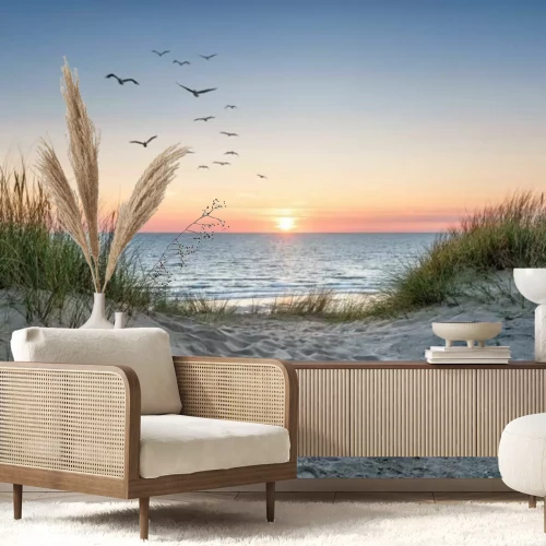 Fotobehang Zandduinen aan zee en de zonsondergang