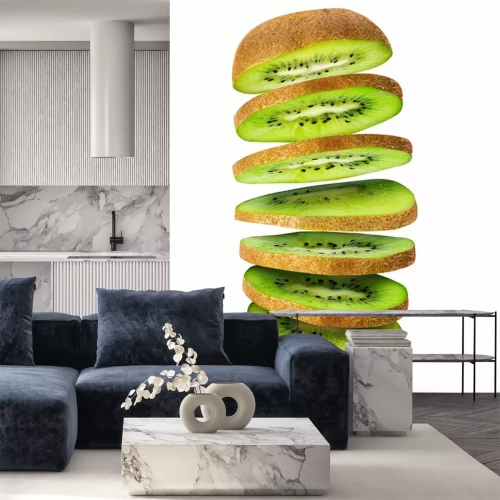 Sticker Fresh sliced kiwi fruit flying in the air isolated on white.