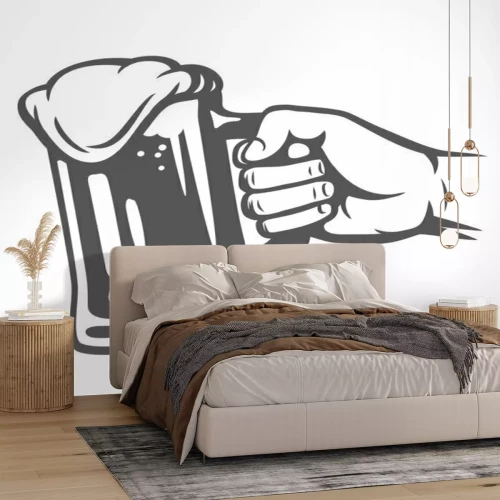Sticker Male hand holding beer glass.