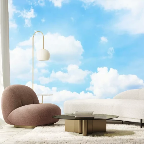 Fotobehang Pluizige wolken in de blauwe lucht