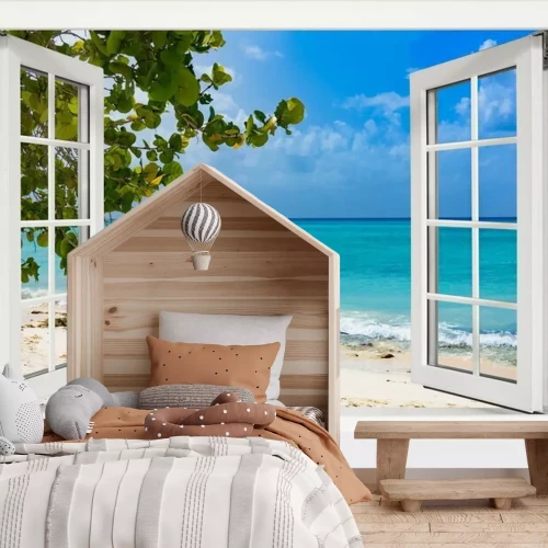 Fotobehang Open raam met uitzicht op een paradijselijk strand